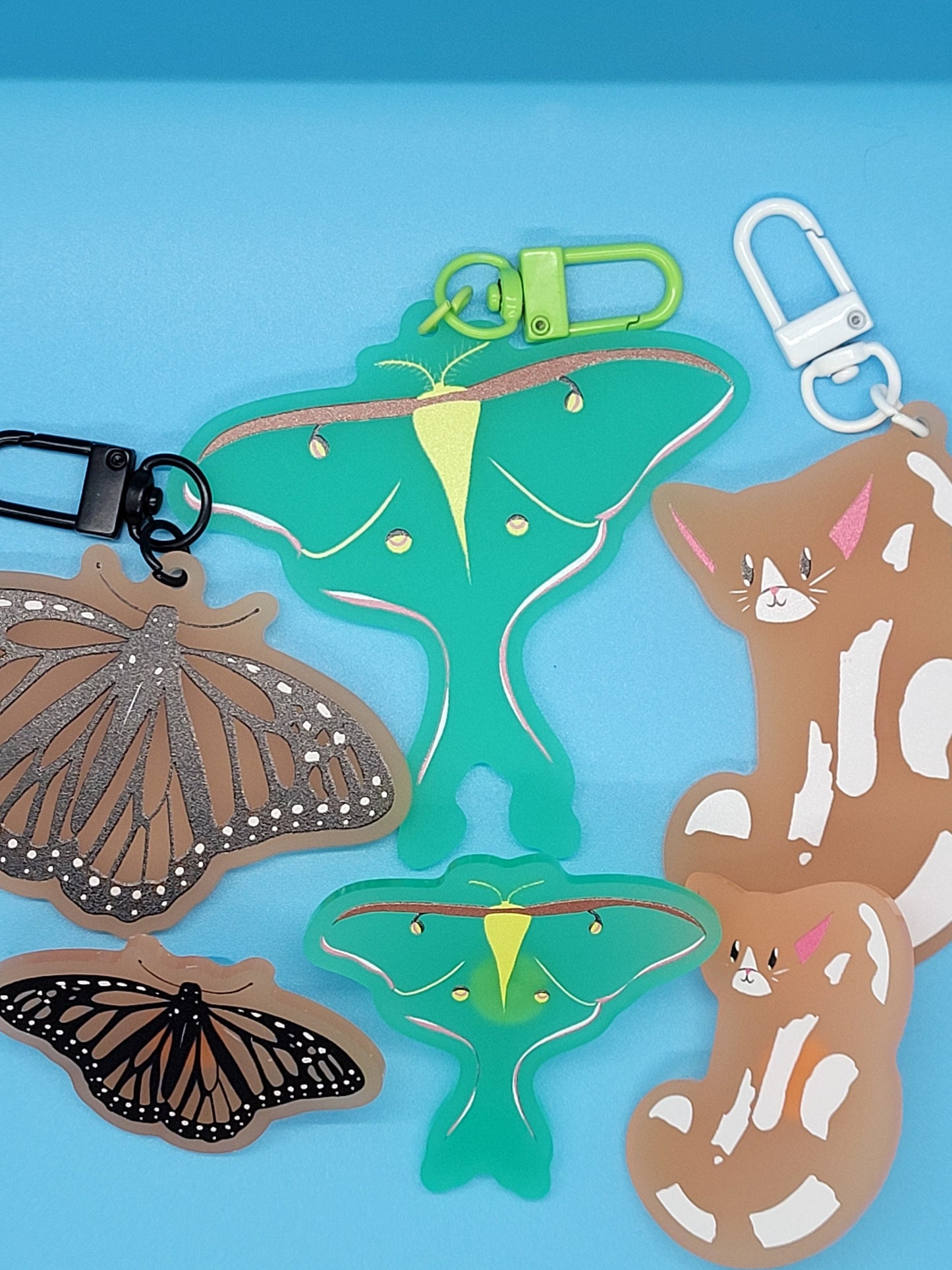 Cute Wildlife Frosted Acrylic Keychains + Pins